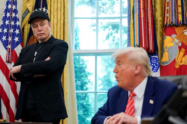 U.S. President Donald Trump and Elon Musk attend a press conference in the Oval Office of the White House in Washington, D.C., U.S., May 30, 2025. REUTERS/Nathan Howard/File Photo