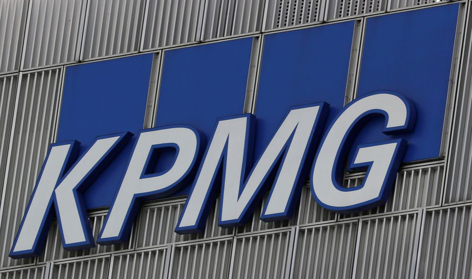The KPMG logo is seen at their offices at Canary Wharf financial district in London,Britain, March 3, 2016.