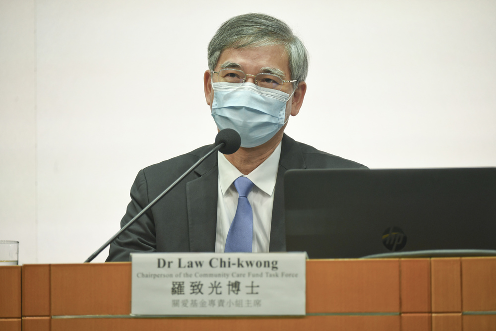 Law Chi-kwong says two leading supermarket chains and large estate management companies have to give an undertaking on sharing the benefits they receive from the government. Law Chi-kwong says two leading supermarket chains and large estate management companies have to give an undertaking on sharing the benefits they receive from the government.