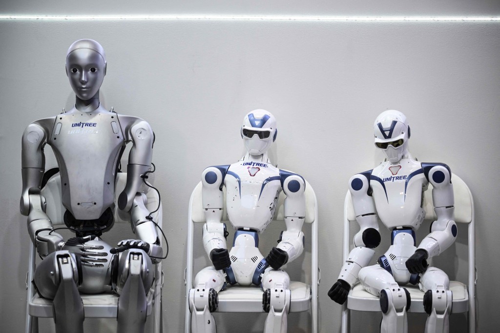  Robots of Unitree Robotics company are displayed at the VivaTech technology startups and innovation fair at the Paris Expo Porte de Versailles, in Paris on June 17, 2026. (Photo by JULIEN DE ROSA / AFP)