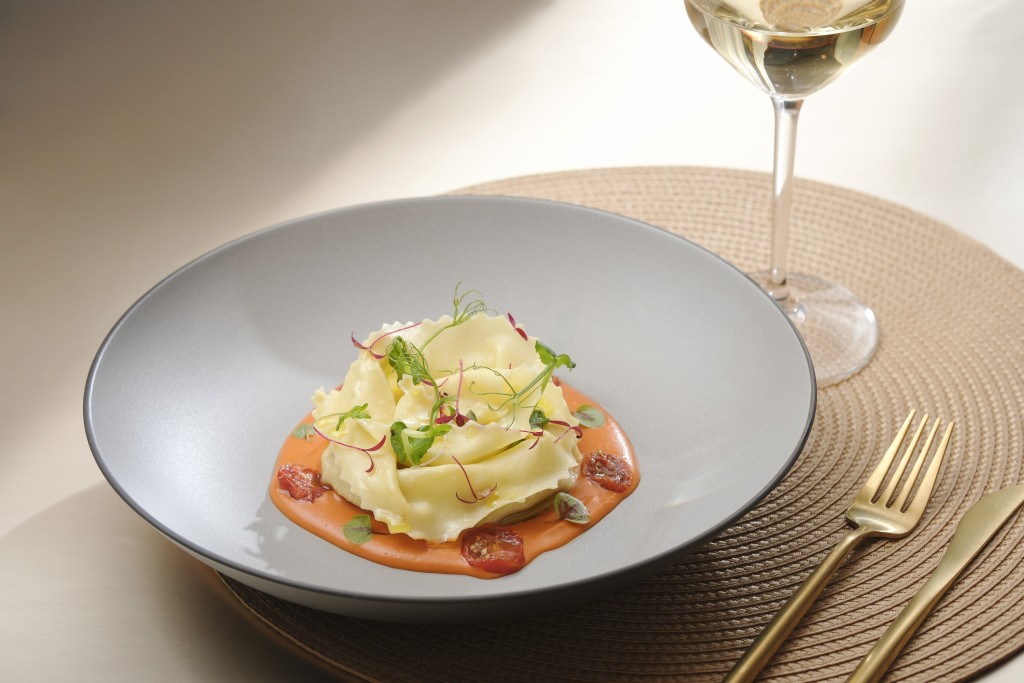 Homemade pork sausage ravioli.