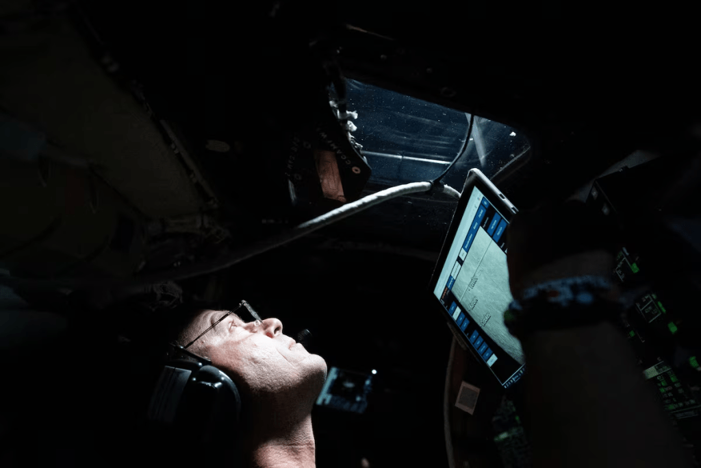 NASA astronaut and Artemis II Commander Reid Wiseman takes a moment during the seven-hour lunar observation period where the crew reported to the ground team their observations including color nuances, which will help enhance scientific understandings of the Moon, April 6, 2026. NASA/Handout via REUTERS