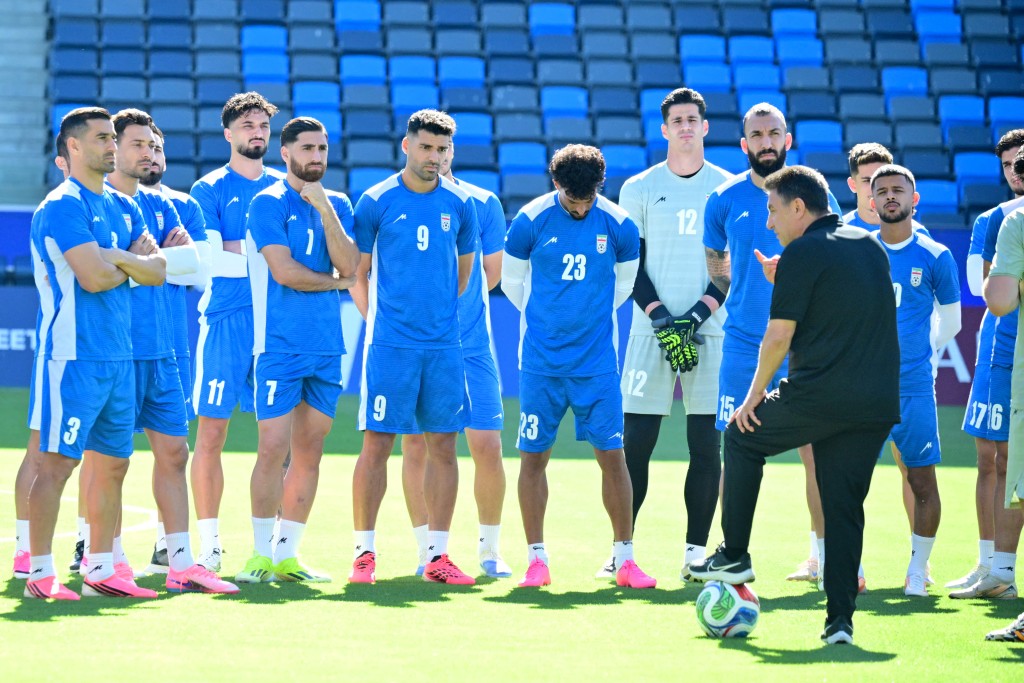 Iran's head coach Amir Ghalenoei speaks to his players during an MD-1 training session at Carson Sports Park in Carson, on June 20, 2026 (AFP)