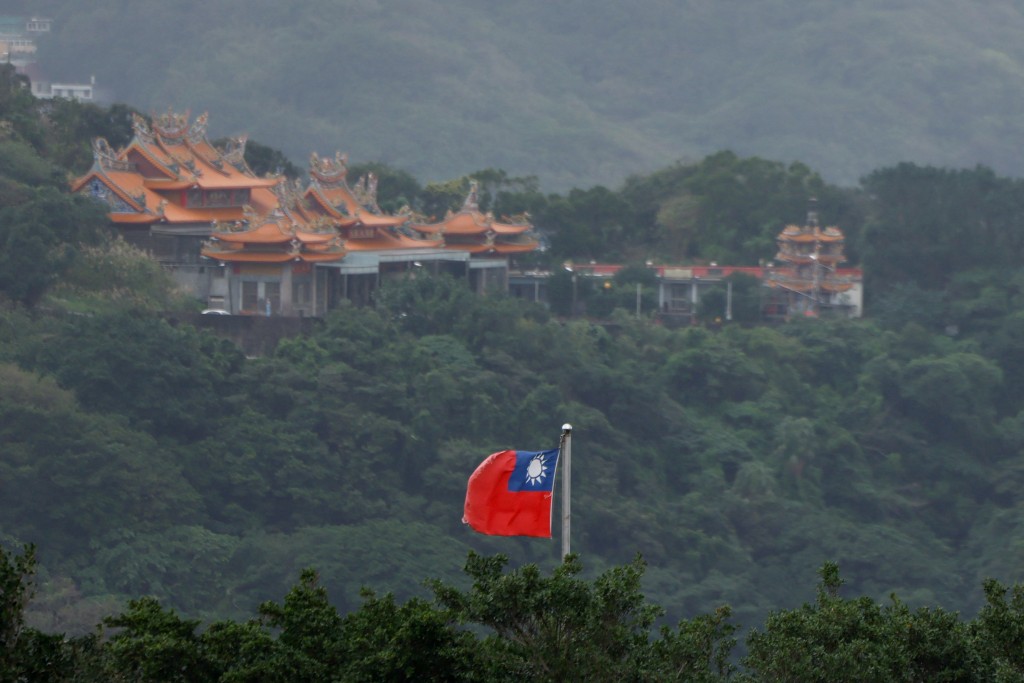 A Taiwan flag flutters in Keelung, as China conducts "Justice Mission 2025" military drills around Taiwan, in Keelung, Taiwan, December 30, 2025. REUTERS/Ann Wang