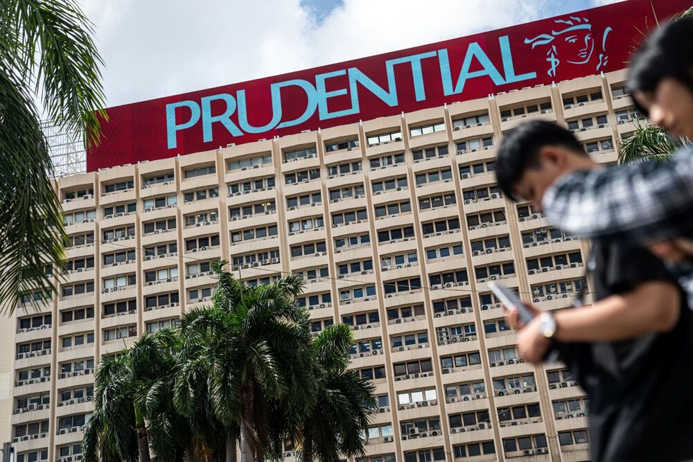 Signage for Prudential Plc atop a building in Hong Kong, China, on Friday, Aug. 2, 2024. Photographer: Lam Yik/Bloomberg Signage for Prudential Plc atop a building in Hong Kong, China, on Friday, Aug. 2, 2024. Photographer: Lam Yik/Bloomberg