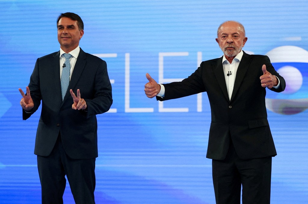 Flavio Bolsonaro and Lula attended a televised debate last Friday. (REUTERS)