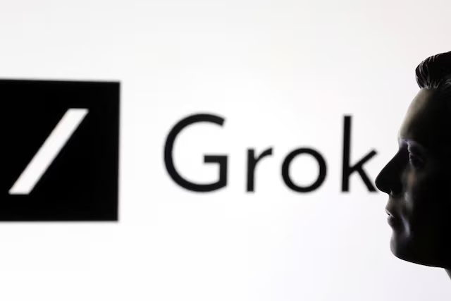 A 3D-printed miniature model of Elon Musk and Grok logo are seen in this illustration taken, February 16, 2025. REUTERS/Dado Ruvic/Illustration/File Photo 