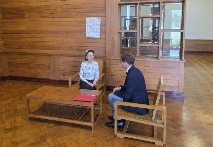 Myanmar's detained former leader Aung San Suu Kyi meets Myanmar's Resident Representative and Head of Delegation for the International Committee of the Red Cross (ICRC) Arnaude de Baecque, in Naypyidaw, Myanmar August 3, 2026. (Reuters)
