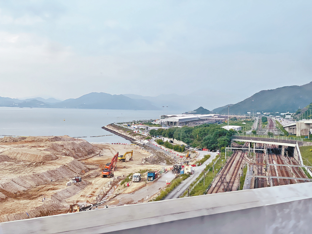 Secretary for Development Bernadette Linn and the Oyster Bay site on Lantau. Secretary for Development Bernadette Linn and the Oyster Bay site on Lantau.
