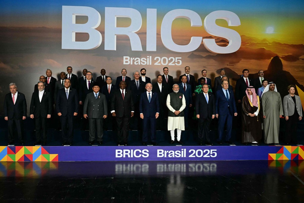 Heads of state and government of member, partner, and external engagement countries pose for a family photo during the BRICS summit in Rio de Janeiro, Brazil, on July 7, 2025. AFP