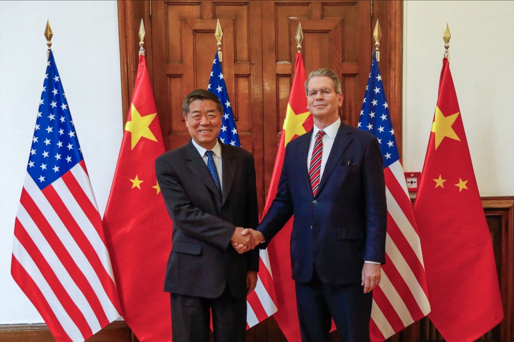 This handout photo obtained on September 15, 2025, from the US Treasury Department shows US Secretary of Treasury Scott Bessent (L) meeting with Chinese Vice Premiere He Lifeng (R) in Madrid, Spain, on September 14, 2025.  AFP