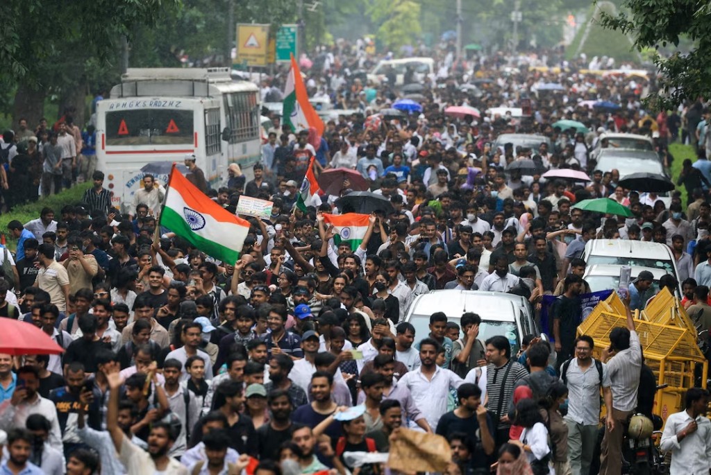 Supporters of the Cockroach Janta Party march toward parliament on the opening day of its monsoon session, demanding the resignation of Education Minister Dharmendra Pradhan over exam paper leaks, in New Delhi, India, 20 July, 2026. REUTERS/Adnan Abidi
