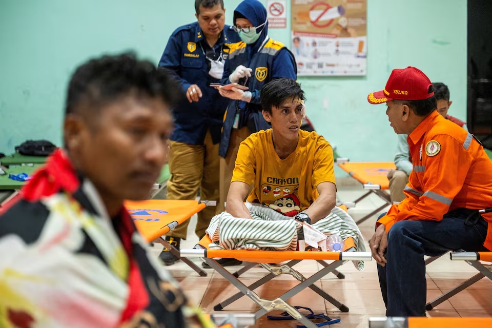 A passenger evacuated from the Virgo Transport 8 ship that sank while sailing from Surabaya in East Java to Banjarmasin in South Kalimantan, receives treatments at Trisakti port in Banjarmasin, South Kalimantan province, Indonesia, September 13, 2026. REUTERS/Stringer/File Photo