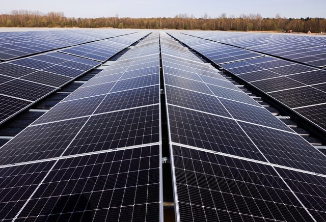 Solar panels are pictured on a floating photovoltaic power plant on lake Silbersee (Lake Silver) in Haltern am See, Germany, April 11, 2022. REUTERS/Thilo Schmuelgen 