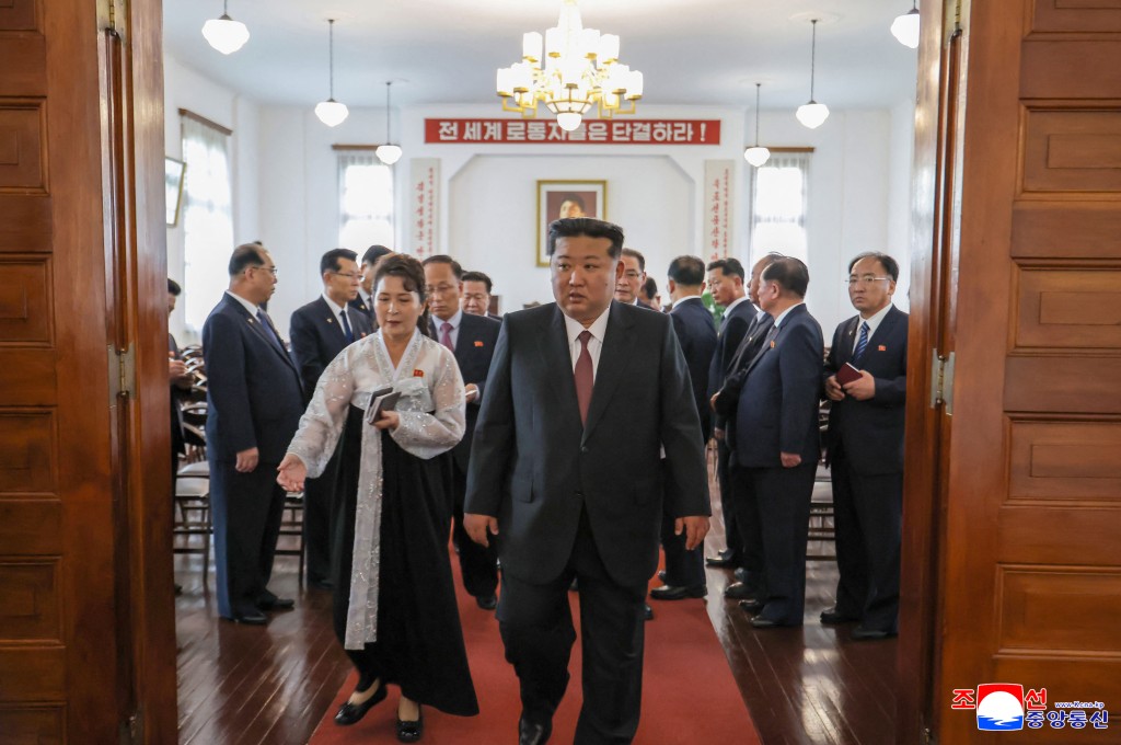 This picture taken on October 8, 2025 and released by North Korea's official Korean Central News Agency (KCNA) on October 9, 2025 shows North Korean leader Kim Jong Un (C) visiting the Party Founding Museum in Pyongyang on the 80th anniversary of the founding of the Workers' Party of Korea. (Photo by KCNA VIA KNS / AFP)