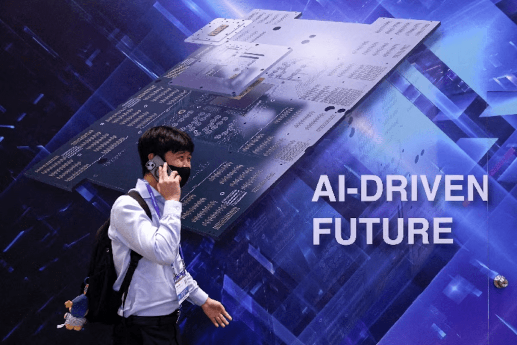 A visitor walks past a display reading "AI-DRIVEN FUTURE" during SEMICON Taiwan in Taipei, Taiwan, September 2, 2026. REUTERS/Ann Wang/File Photo