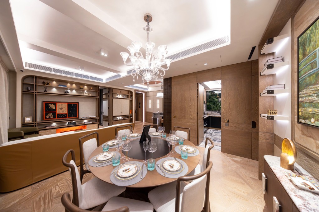A dining and living room setup for an MVP unit. Photo from EMPEROR INTERNATIONAL