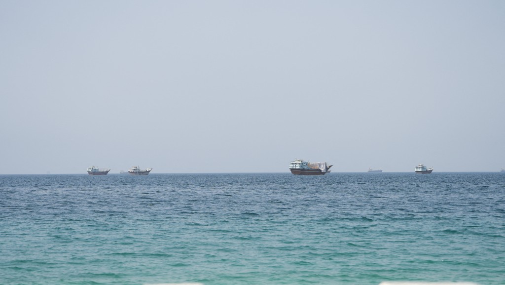 Vessels near the Strait of Hormuz, as seen from Musandam, Oman, August 6, 2026. REUTERS/Stringer