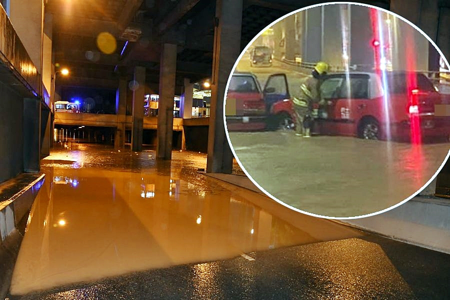 Kwun Tong Road was flooded amid the storm, at least two taxi broke down. Photo: Internet