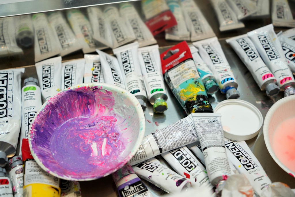 Ayako Rokkaku paints directly with her hands, allowing instinct to guide each movement as forms emerge naturally on the canvas.