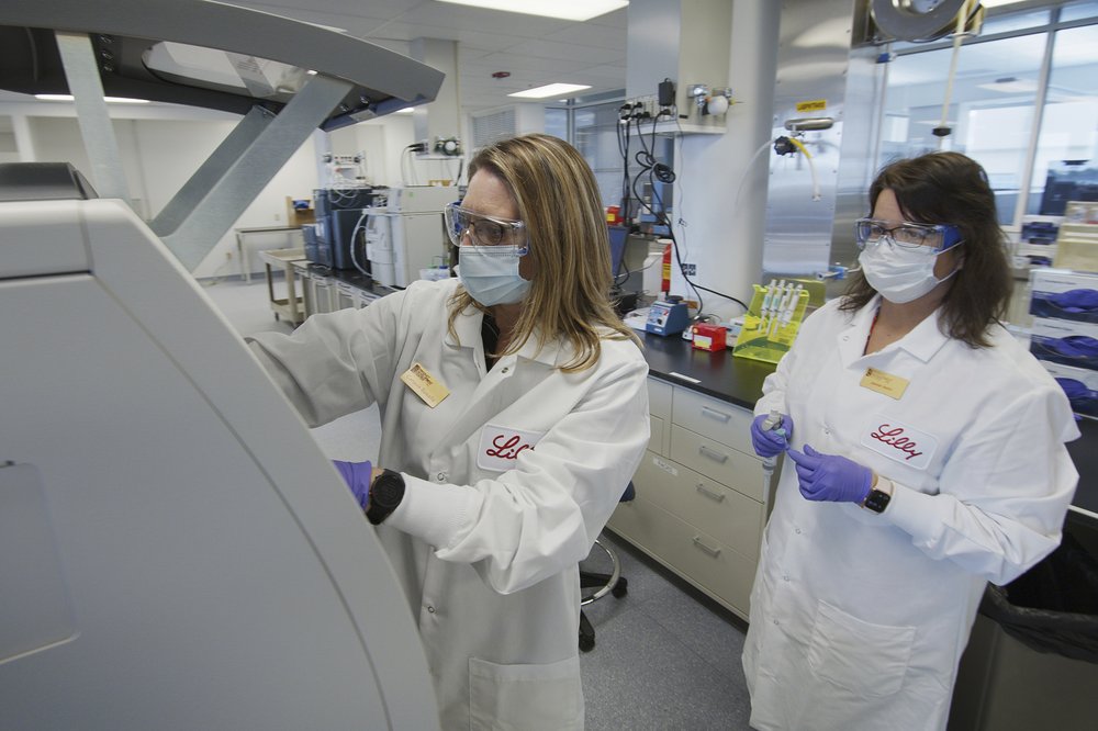Eli Lilly, researchers prepare cells to produce possible COVID-19 antibodies for testing in a laboratory in Indianapolis. Eli Lilly, researchers prepare cells to produce possible COVID-19 antibodies for testing in a laboratory in Indianapolis.