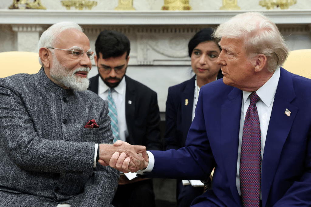 U.S. President Donald Trump and Indian Prime Minister Narendra Modi shake hands, at the White House in Washington, D.C., U.S., February 13, 2025. REUTERS/Kevin Lamarque/File Photo 