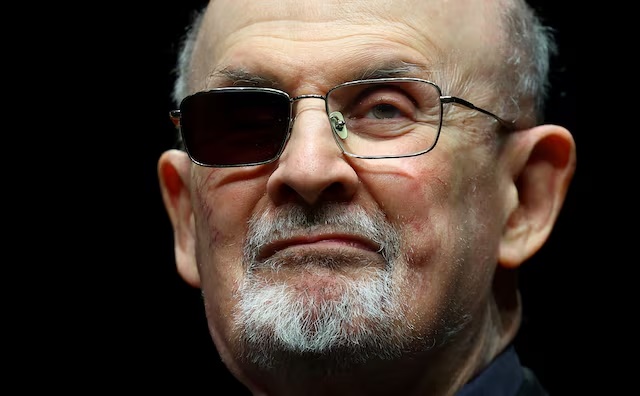 Author Salman Rushdie poses during a photocall ahead of the presentation of his book "Knife: Meditations After an Attempted Murder" at the Deutsches Theater in Berlin, Germany, May 16, 2024. REUTERS/Fabrizio Bensch 