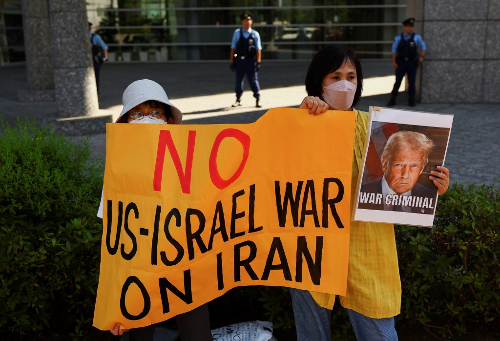 Protesters outside the US embassy in Tokyo, Japan.  REUTERS