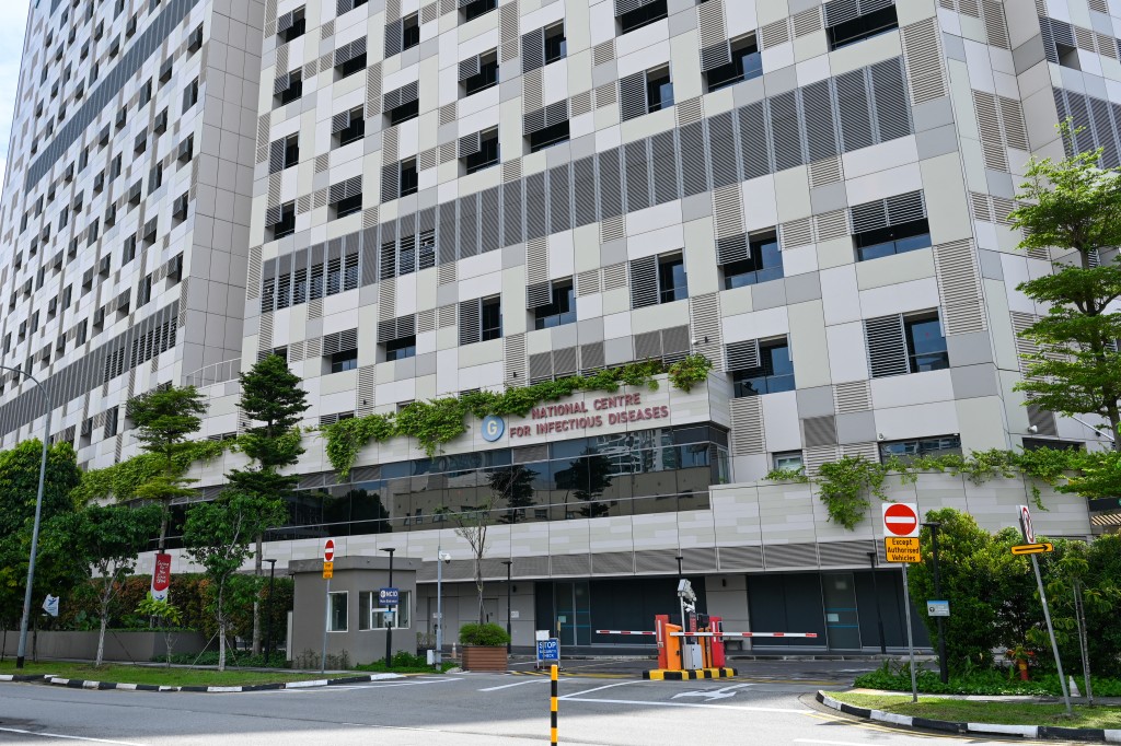 Photo by ROSLAN RAHMAN / AFP  This photo shows a general view of Singapore’s National Centre for Infectious Diseases (NCID) in Singapore on May 8, 2026.