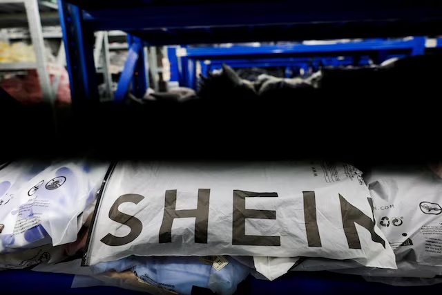 Packs of clothing are displayed at a garment factory for Shein in Panyu District, Guangzhou, Guangdong province, China, July 27, 2026. REUTERS/Go Nakamura/File Photo