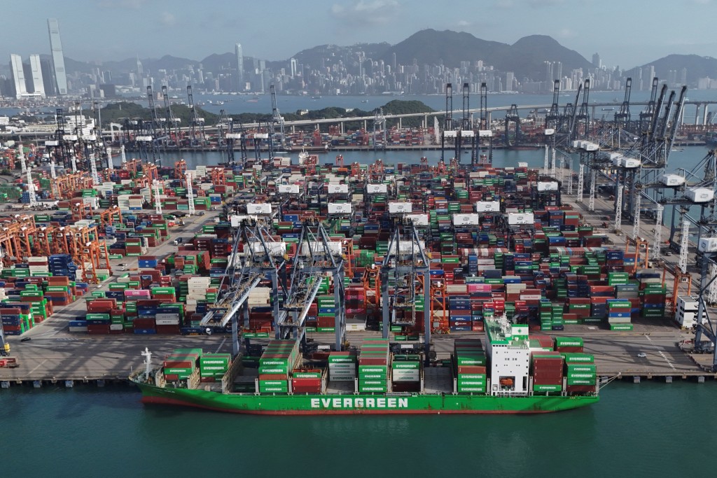 A drone view shows an Evergreen Marine container ship at a port in Kwai Chung, Hong Kong, China April 16, 2025. REUTERS/Tyrone Siu