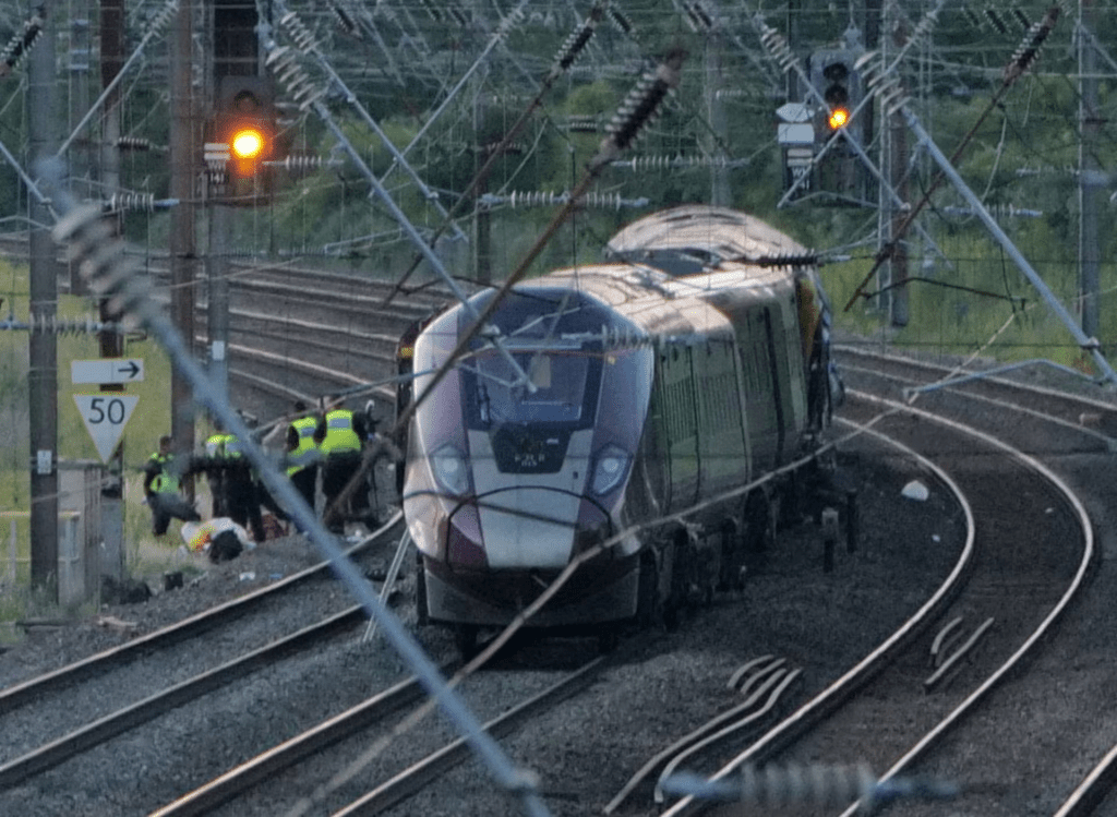 Emergency service workers gather at the scene of a collision involving two trains near Bedford, Britain, June 19, 2026. REUTERS/Stringer Emergency service workers gather at the scene of a collision involving two trains near Bedford, Britain, June 19, 2026. REUTERS/Stringer
