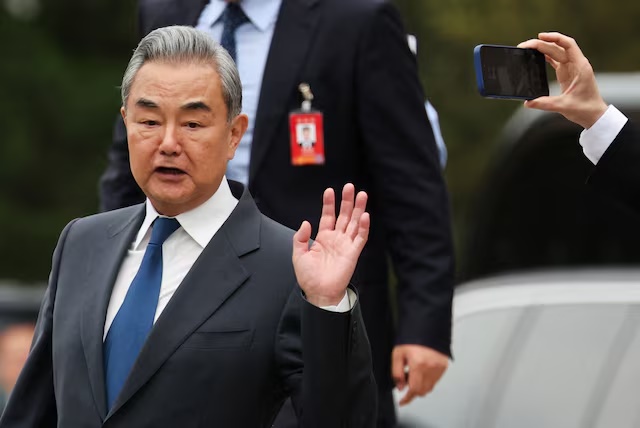Chinese Foreign Minister Wang Yi leaves the Great Hall of the People in Beijing, China, May 20, 2026. REUTERS/Maxim Shemetov/Pool