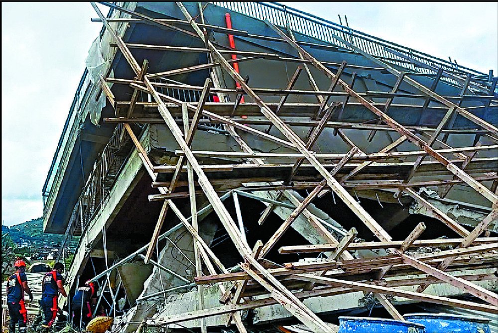 Buildings in Benguet, Ilocos Sur and Abra provinces toppled while boulders fall on a road in Bauko, Mountain Province. AFP, REUTERS, AP