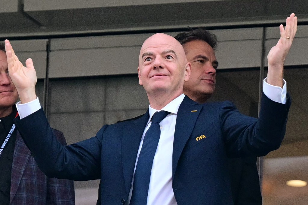 Photo by FREDERIC J. BROWN / AFP FIFA president Gianni Infantino reacts during the 2026 World Cup Group D football match between USA and Paraguay at the Los Angeles Stadium in Inglewood on June 12, 2026.
