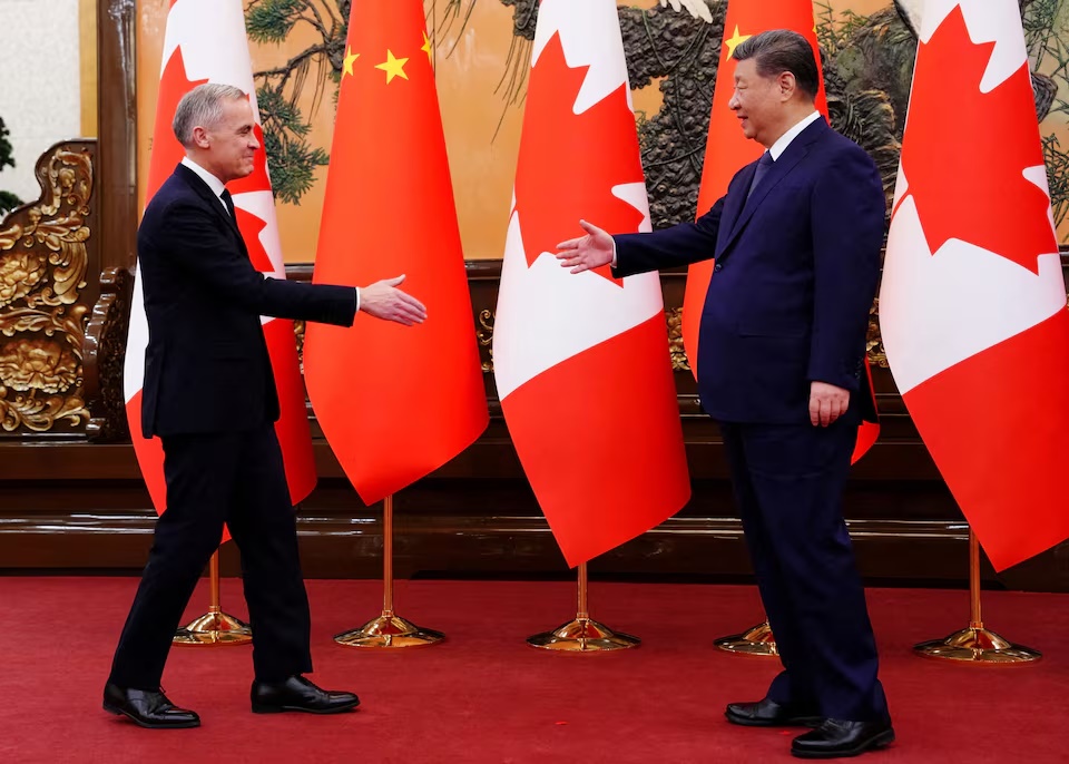 Canadian Prime Minister Mark Carney meets with President of China Xi Jinping at the Great Hall of the People in Beijing, China on Friday, Jan. 16, 2026. Sean Kilpatrick/Pool via REUTERS 