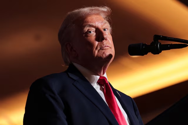 U.S. President Donald Trump looks on as he delivers remarks on the U.S. economy and affordability at the Mount Airy Casino Resort in Mount Pocono, Pennsylvania, U.S. December 9, 2025. REUTERS/Jonathan Ernst