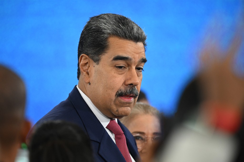 Venezuela's President Nicolas Maduro arrives at a press conference with international media at the Hotel Eurobuilding in Caracas on September 15, 2025. (Photo by Federico PARRA / AFP)
