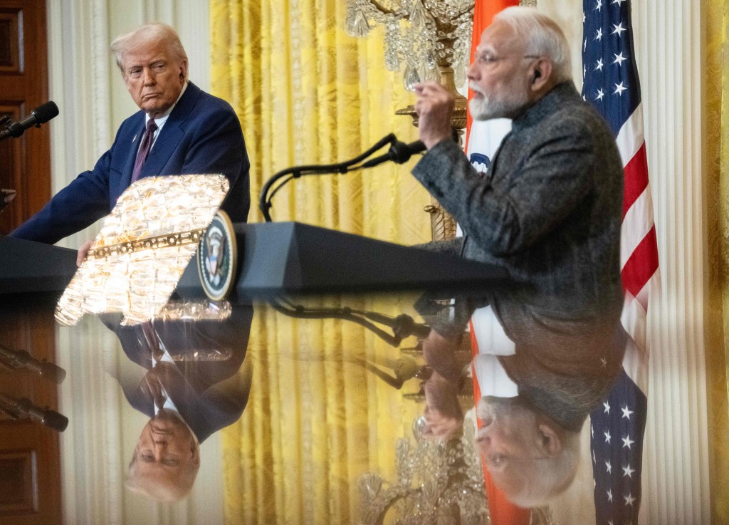 US President Donald Trump and Indian Prime Minister Narendra Modi hold a joint press conference in the East Room of the White House in Washington, DC, on February 13, 2025. (Photo by ANDREW CABALLERO-REYNOLDS / AFP)