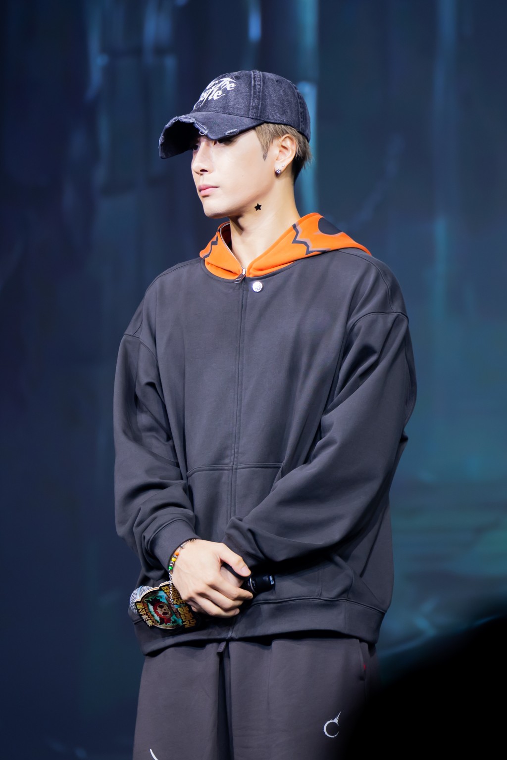 Jackson Wang appears slightly tired during his Ocean Park appearance.