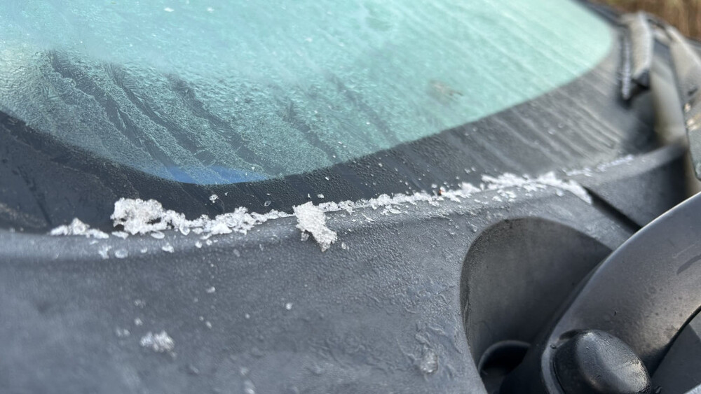 Frost is seen on the windscreen of a vehicle in Sha Tau Kok.