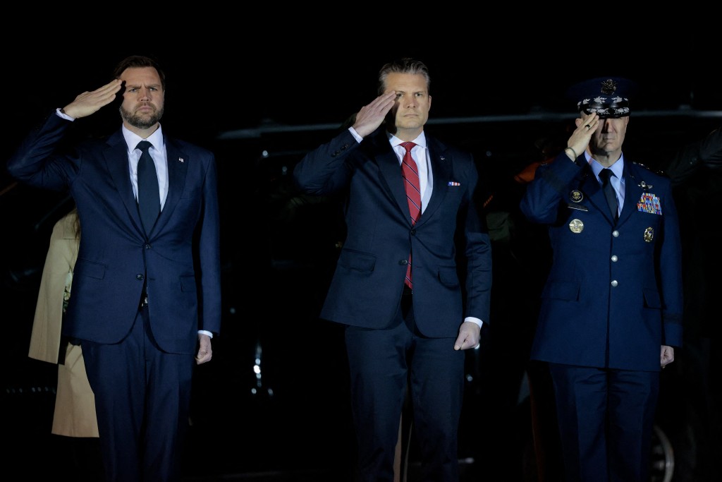 Vice President JD Vance (L) and Secretary of War Pete Hegseth salute as a U.S. Army carry team moves a flag-draped transfer case containing the remains of Army Sgt. Benjamin N. Pennington at Dover Air Force Base on March 9, 2026 in Dover, Delaware. (AFP)