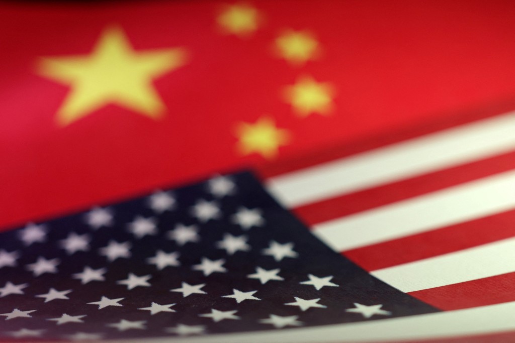 US and Chinese flags are seen in this illustration taken April 10, 2025. REUTERS/Dado Ruvic