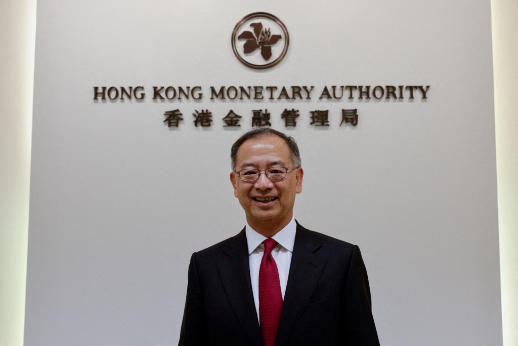 Eddie Yue poses for a picture. Reuters