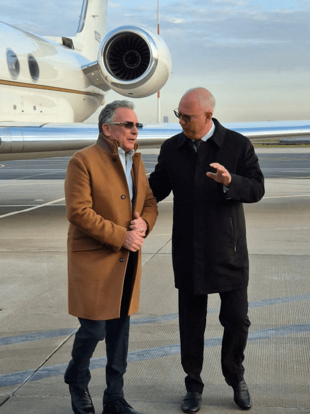 Russian presidential envoy Kirill Dmitriev greets US special envoy Steve Witkoff upon his arrival at Pulkovo Airport in Saint Petersburg, Russia, October 21, 2026. Obtained by Reuters/Handout via REUTERS