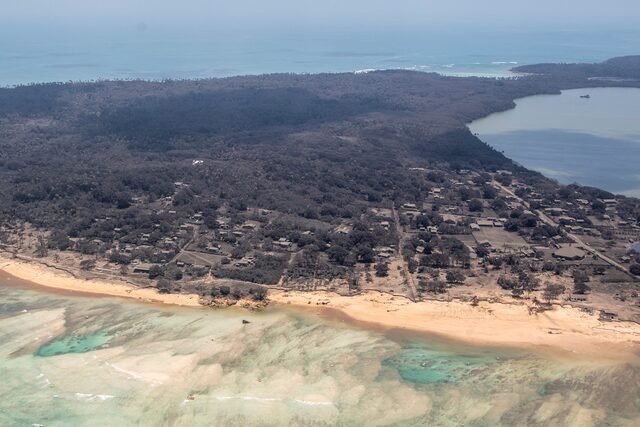 A general view from a New Zealand Defence Force P-3K2 Orion surveillance flight shows heavy ash fall over Nomuka in Tonga after the Pacific island nation was hit by a tsunami triggered by an undersea volcanic eruption January 17, 2022. New Zealand Defence Force/Handout via REUTERS 