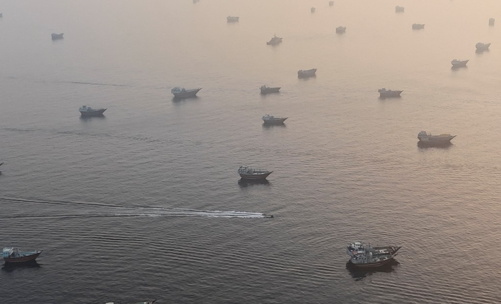A drone view shows vessels in the Strait of Hormuz, as seen from Musandam, Oman, June 15, 2026. (Reuters)