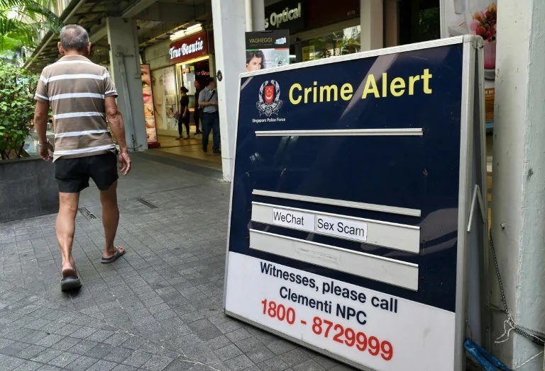 Police figures show that scam losses in 2024 shot up 70 percent from the previous year (Roslan RAHMAN) (Roslan RAHMAN/AFP/AFP) Police figures show that scam losses in 2024 shot up 70 percent from the previous year (Roslan RAHMAN) (Roslan RAHMAN/AFP/AFP)