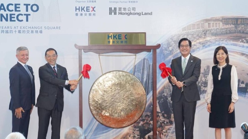 Bonnie Chan (right), Michael Smith (left) and Carlson Tong (second left).