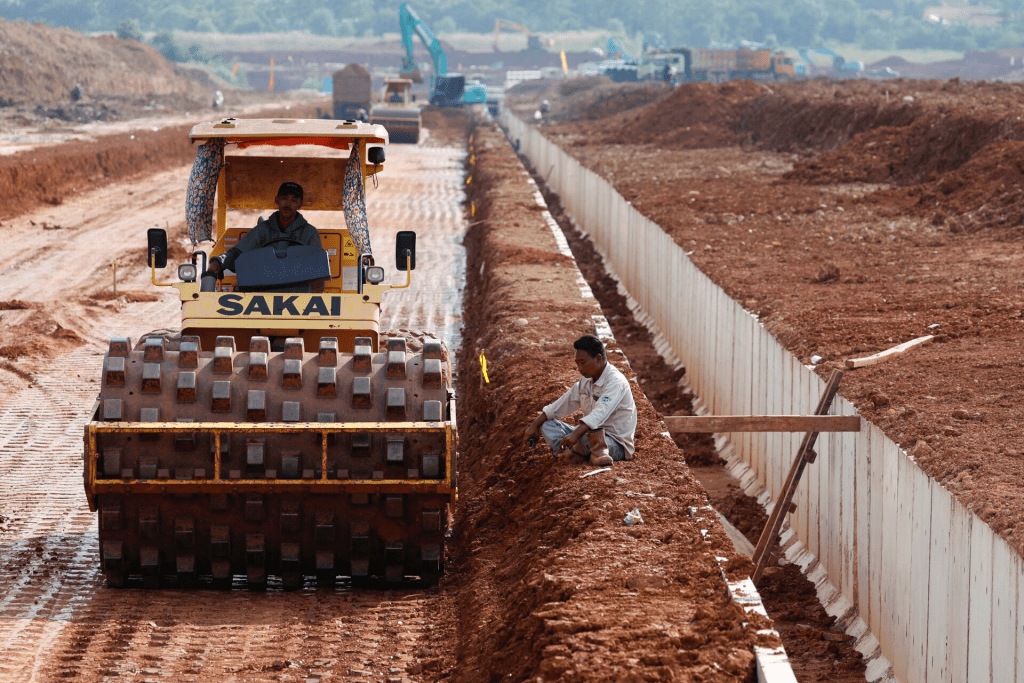 A worker operates a sheepsfoot roller at Subang Smartpolitan area amid growing interest from Chinese investors to relocate their factories to Southeast Asia, including Indonesia, to shield themselves from the hefty U.S. import tariffs, in Subang, West Java Province, Indonesia, June 13, 2025. REUTERS/Ajeng Dinar Ulfiana